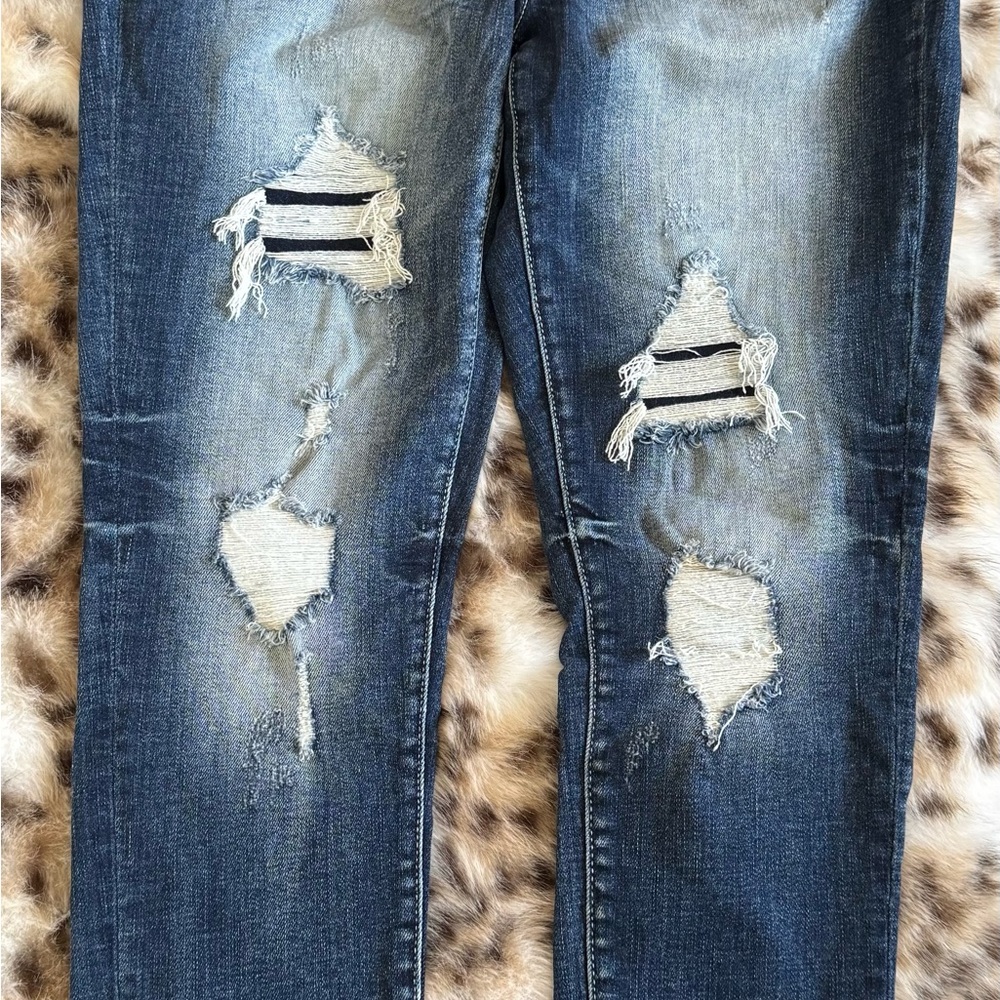 Distressed Blue Jeans